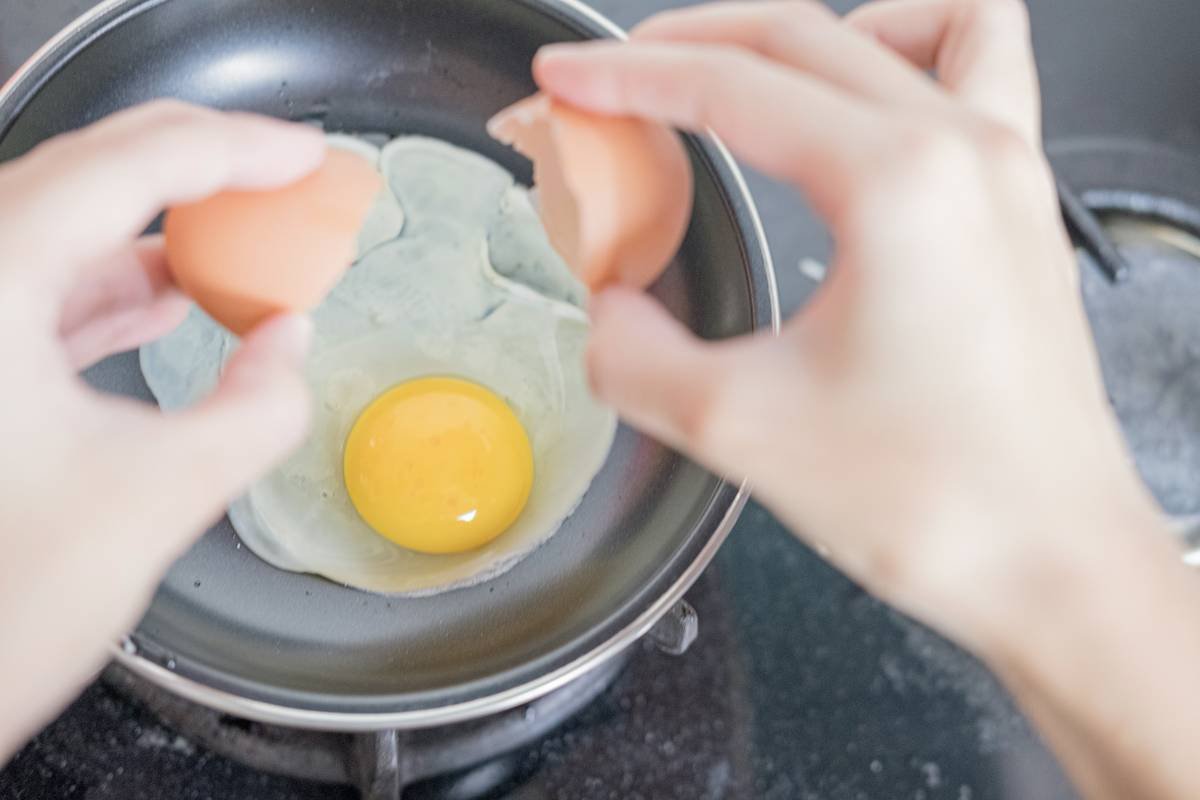 Close-up of perfectly poached eggs using an egg poacher—illustrating what is poaching an egg